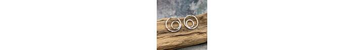 Eccentric circles silver stud earrings