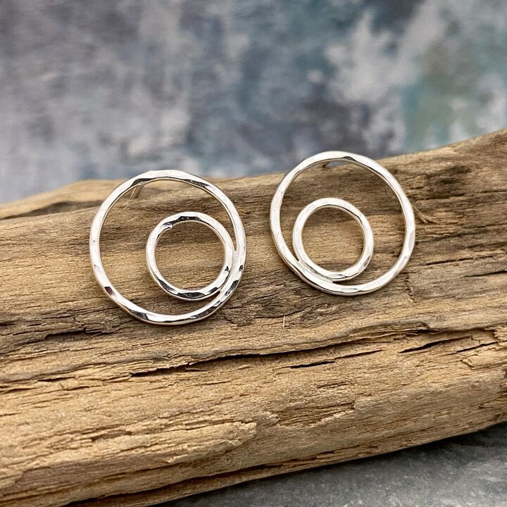 Eccentric circles silver stud earrings