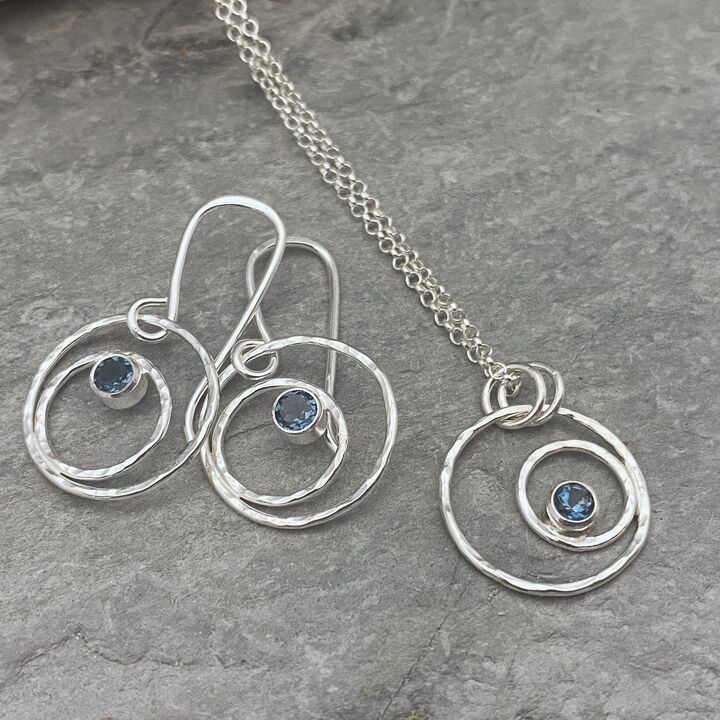 Small silver circles pendant with a Topaz gemstone 2