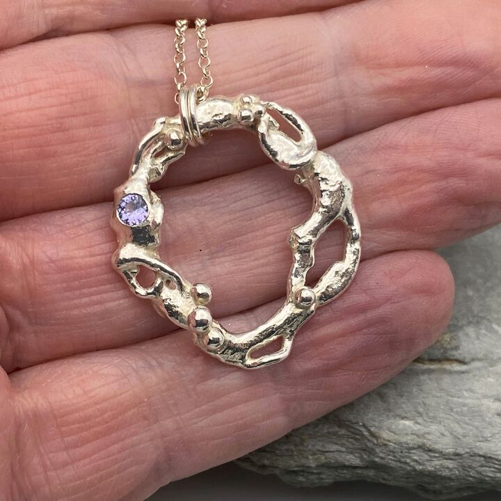 Recycled silver and Tanzanite circle pendant 