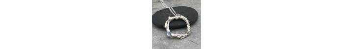 Topaz and silver circle necklace