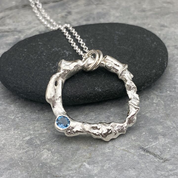 Topaz and silver circle necklace