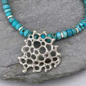 This is a picture of a turquoise necklace