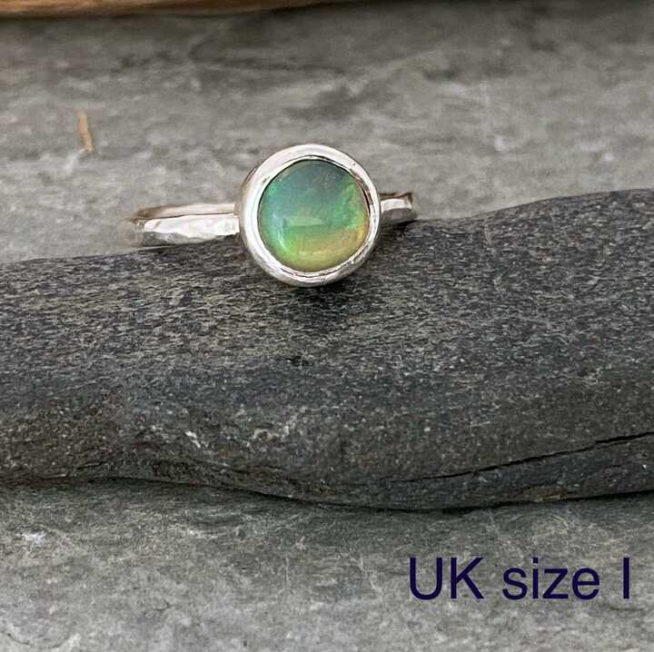 1 outlet .5ct Natural Opal Ring. S7